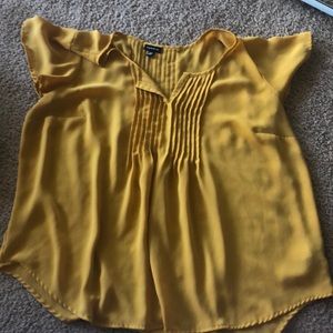 Torrid yellow flowy shirt
